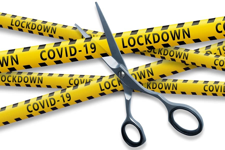 scissor cutting covid lockdown tape