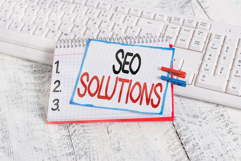 "SEO solutions" written on paper
