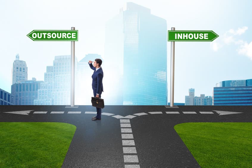fork in the road leading to insource or outsource
